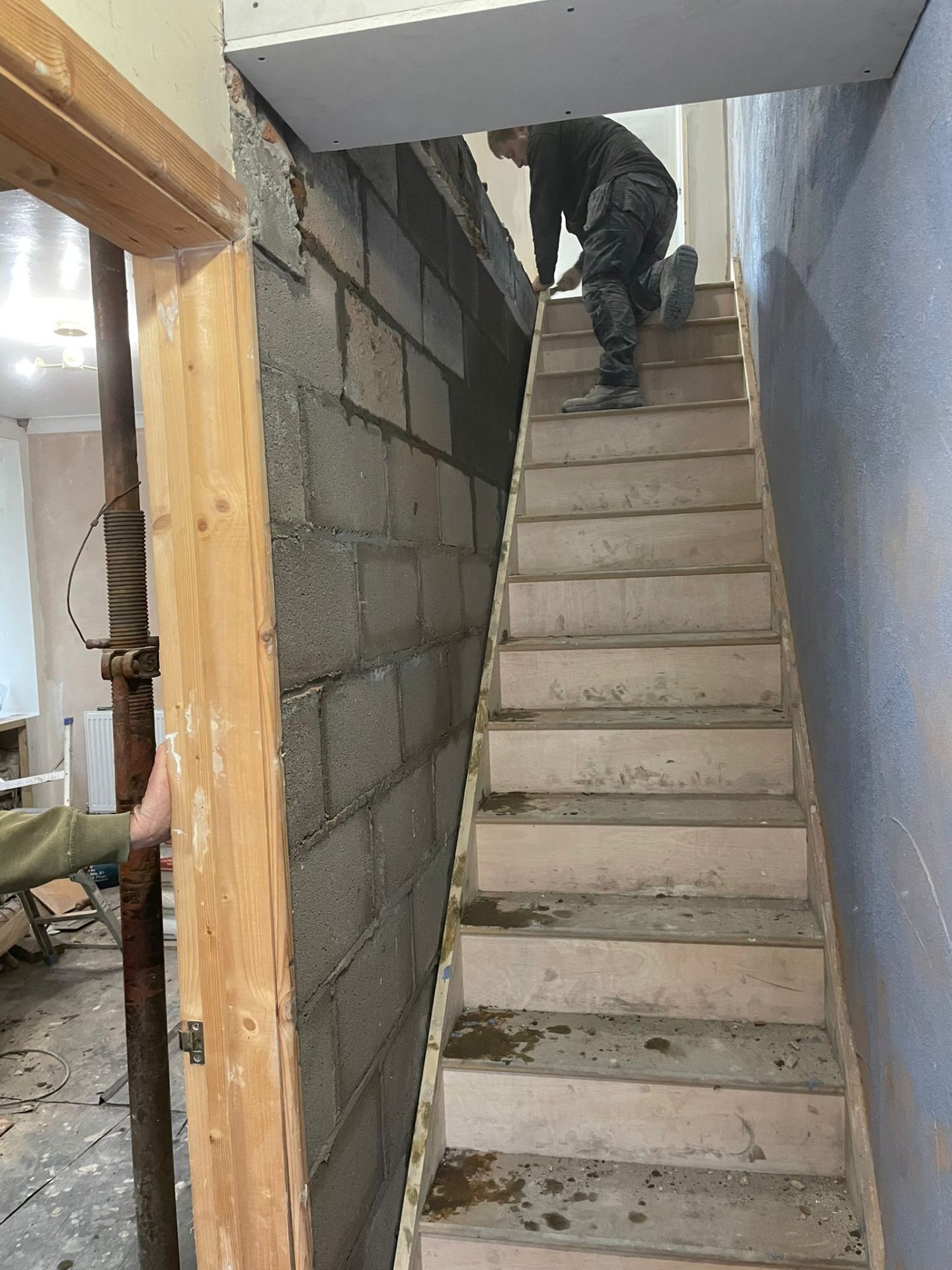 New build staircase installation with blockwork walls in South Wales property